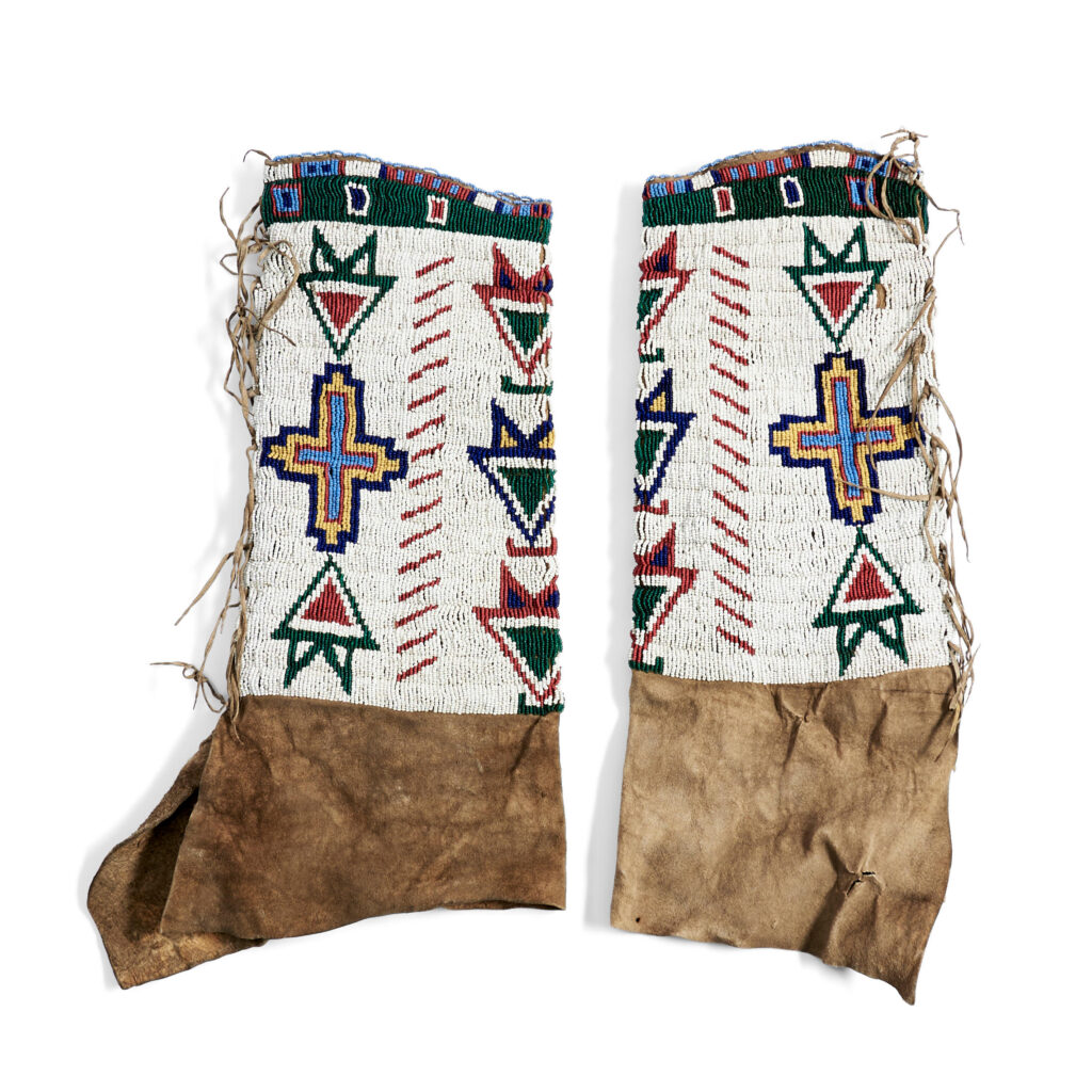 A pair of Sioux beaded hide women's leggings